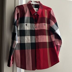Burberry button downed shirt. Seven-year-old. As brand new condition.